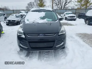 2016 Ford Escape Titanium with VIN 1FMCU9J96GUC08563, listed as a IAAI auction lot 41252475 with 120,404 mi miles. Bid and sale history available at carsss.com. Image 12.