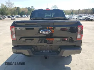 2024 Ford Ranger XLT with VIN 1FTER4HH7RLE02106, listed as a Copart auction lot 50977165 with 3,555 mi miles and Salvage title. Bid and sale history available at DreamBid. Image 6.