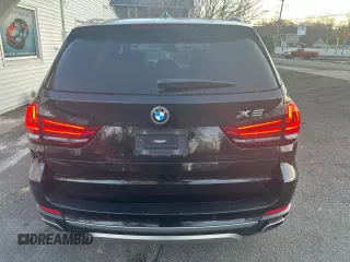 2018 BMW X5 xDrive35i with VIN 5UXKR0C57J0X83615, listed as a Copart auction lot 83307484 with 174,911 mi miles and Clean Title. Bid and sale history available at carsss.com. Image 6.