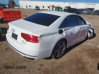 2013 Audi A8 4.0L with VIN WAUA2AFD9DN017867, listed as a IAAI auction lot 40430651 with 114,928 mi miles and . Bid and sale history available at DreamBid. Image 4.
