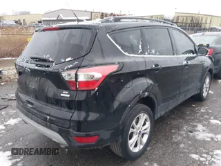 2017 Ford Escape SE with VIN 1FMCU0GD5HUD08968, listed as a IAAI auction lot 42008576 with 95,363 mi miles and . Bid and sale history available at DreamBid. Image 4.