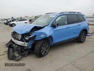 2025 Honda Passport TrailSport z VIN 5FNYF8H65SB002839, wystawiony jako Copart lot #52984215 z przebiegiem 469 mil mil oraz Szkoda całkowita • Salvage title. Historia ofert i sprzedaży dostępna na DreamBid. Obrazek 1.