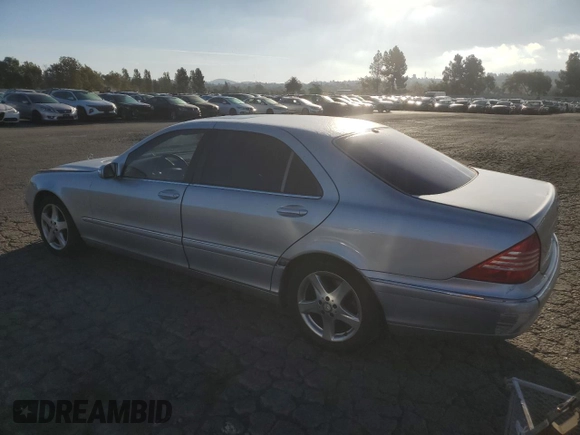 2005 Mercedes-Benz S-Class 4.3L with VIN WDBNG70J15A453434, listed as a Copart auction lot 77212554 with 247,643 mi miles and Clean Title. Bid and sale history available at carsss.com. Image 2.