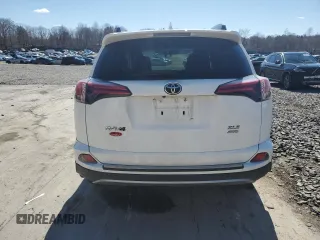 2018 Toyota RAV4 XLE with VIN 2T3RFREV8JW750032, listed as a Copart auction lot 53676475 with Not Provided miles and Salvage Title. Bid and sale history available at DreamBid. Image 6.