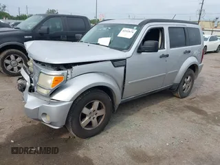 2008 Dodge Nitro SXT z VIN 1D8GT28K38W124264, wystawiony jako IAAI lot #41933674 z przebiegiem 292 756 mil mil oraz . Historia ofert i sprzedaży dostępna na DreamBid. Obrazek 2.