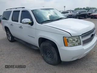 2010 Chevrolet Suburban LS z VIN 1GNUKHE37AR128351, wystawiony jako IAAI lot #42304912 z przebiegiem 160 353 mil mil oraz . Historia ofert i sprzedaży dostępna na DreamBid. Obrazek 1.