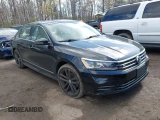 2016 Volkswagen Passat 1.8T S with VIN 1VWAT7A34GC068563, listed as a IAAI auction lot 41983202 with 60,562 mi miles. Bid and sale history available at carsss.com. Image 1.