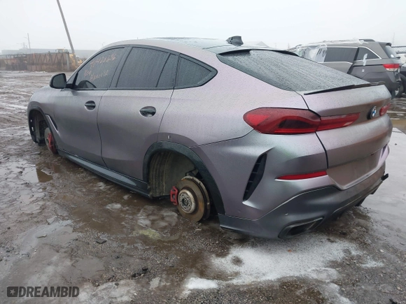 2021 BMW X6 xDrive40i with VIN 5UXCY6C07M9G44005, listed as a IAAI auction lot 41428636 with 65,670 mi miles. Bid and sale history available at carsss.com. Image 3.