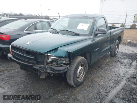 1999 Dodge Dakota SLT with VIN 1B7FL26XXXS209424, listed as a IAAI auction lot 41264544 with 70,523 mi miles. Bid and sale history available at carsss.com. Image 2.