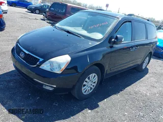2014 Kia Sedona LX with VIN KNDMG4C71E6579260, listed as a IAAI auction lot 41985403 with 93,523 mi miles. Bid and sale history available at carsss.com. Image 2.