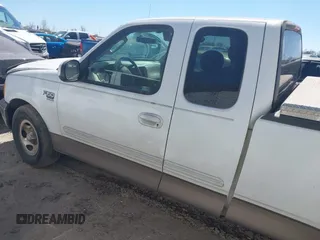 2003 Ford F-150 XL with VIN 1FTRX17W33NB65471, listed as a IAAI auction lot 41627618 with 1 mi miles. Bid and sale history available at carsss.com. Image 3.