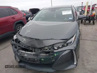2018 Toyota Prius Plus with VIN JTDKARFPXJ3087064, listed as a IAAI auction lot 41433495 with 118,298 mi miles and . Bid and sale history available at DreamBid. Image 12.