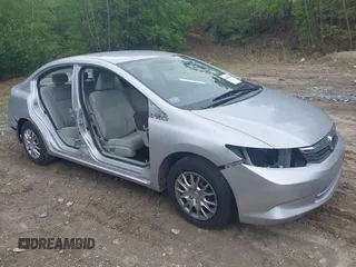 2012 Honda Civic LX with VIN 2HGFB2F59CH570602, listed as a IAAI auction lot 42241041 with 134,134 mi miles and . Bid and sale history available at DreamBid. Image 1.