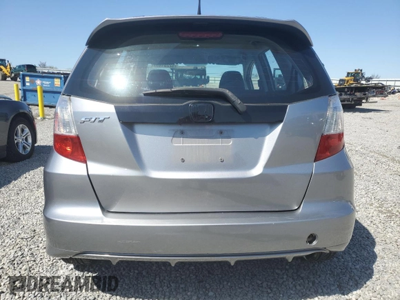 2009 Honda Fit Sport z VIN JHMGE88489S010278, wystawiony jako Copart lot #52251405 z przebiegiem 120 511 mil mil oraz Szkoda całkowita • Salvage title. Historia ofert i sprzedaży dostępna na DreamBid. Obrazek 6.