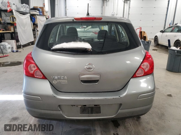 2010 Nissan Versa 1.8 SL with VIN 3N1BC1CP4AL448781, listed as a Copart auction lot 41463005 with 228,959 mi miles and Clean Title. Bid and sale history available at carsss.com. Image 6.