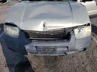 2004 Ford Escape XLS with VIN 1FMYU021X4KA41111, listed as a Copart auction lot 45393765 with 125,492 mi miles and Salvage Title. Bid and sale history available at DreamBid. Image 13.