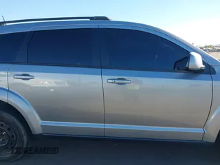 2019 Dodge Journey SE with VIN 3C4PDCBG0KT701223, listed as a IAAI auction lot 41286446 with 71,572 mi miles and . Bid and sale history available at DreamBid. Image 13.