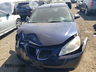 2009 Pontiac G6 w/1SA *Ltd Avail* with VIN 1G2ZG57N294125190, listed as a Copart auction lot 69591384 with 215,658 mi miles and Salvage Title. Bid and sale history available at carsss.com. Image 5.