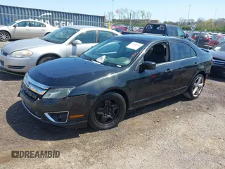 2011 Ford Fusion SE with VIN 3FAHP0HA6BR153888, listed as a IAAI auction lot 42009992 with 213,676 mi miles. Bid and sale history available at carsss.com. Image 2.