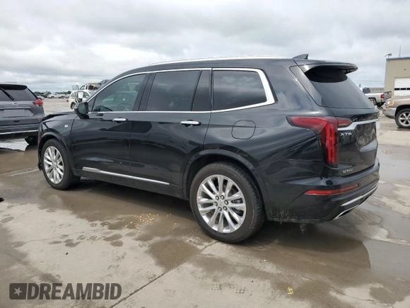 2020 Cadillac XT6 FWD Premium Luxury with VIN 1GYKPCRS9LZ148944, listed as a Copart auction lot 54406745 with 64,086 mi miles and Salvage title. Bid and sale history available at DreamBid. Image 2.