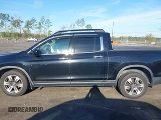 2018 Honda Ridgeline RTL-E z VIN 5FPYK3F78JB013981, wystawiony jako IAAI lot #41844954 z przebiegiem 101 794 mil mil oraz . Historia ofert i sprzedaży dostępna na DreamBid. Obrazek 13.