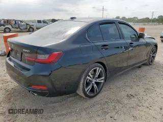 2023 BMW 3 Series 330i with VIN 3MW69FF08P8D30427, listed as a Copart auction lot 58085895 with 27,608 mi miles and Salvage title. Bid and sale history available at DreamBid. Image 3.
