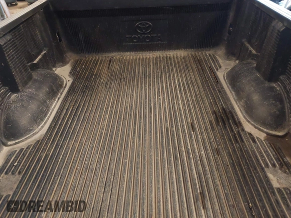 2004 Toyota Tundra SR5 with VIN 5TBDT44104S441271, listed as a IAAI auction lot 41823831 with 296,637 mi miles and . Bid and sale history available at DreamBid. Image 18.