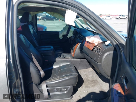 2007 Chevrolet Tahoe LTZ with VIN 1GNFC13J97R155705, listed as a IAAI auction lot 40914171 with 165,727 mi miles and . Bid and sale history available at DreamBid. Image 5.