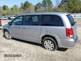 2018 Dodge Grand Caravan SE Plus with VIN 2C4RDGBG0JR136750, listed as a Copart auction lot 50957305 with 106,996 mi miles and Salvage Title. Bid and sale history available at DreamBid. Image 2.
