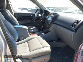 2005 Acura MDX with VIN 2HNYD18205H552503, listed as a IAAI auction lot 42004868 with 210,814 mi miles. Bid and sale history available at carsss.com. Image 5.