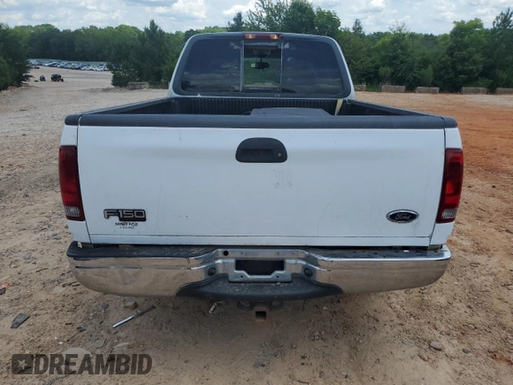 2000 Ford F-150 XL with VIN 1FTRX17L4YNB99870, listed as a Copart auction lot 60287985 with Not provided miles and Salvage title. Bid and sale history available at DreamBid. Image 6.