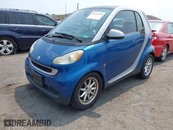 2008 Smart fortwo Pure z VIN WMEEJ31X88K195623, wystawiony jako IAAI lot #42470738 z przebiegiem 123 494 mil mil oraz . Historia ofert i sprzedaży dostępna na DreamBid. Obrazek 2.