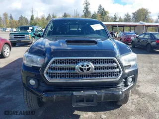 2016 Toyota Tacoma SR5 with VIN 5TFDZ5BN7GX001869, listed as a IAAI auction lot 40610002 with 184,380 mi miles. Bid and sale history available at carsss.com. Image 12.