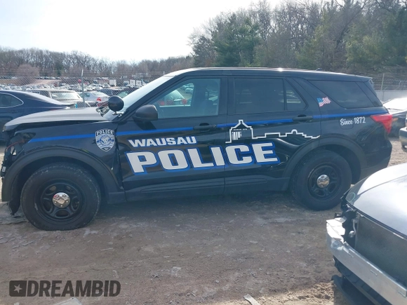 2020 Ford Police Interceptor Utility z VIN 1FM5K8AB2LGC51317, wystawiony jako IAAI lot #41755681 z przebiegiem 102 945 mil mil oraz . Historia ofert i sprzedaży dostępna na DreamBid. Obrazek 14.