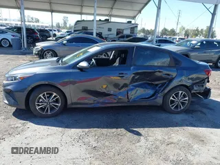 2023 Kia Forte LXS with VIN 3KPF24AD6PE648764, listed as a IAAI auction lot 41866394 with 26,341 mi miles and . Bid and sale history available at DreamBid. Image 14.