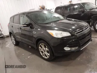 2013 Ford Escape SEL with VIN 1FMCU9H99DUD11347, listed as a IAAI auction lot 41758824 with 154,339 mi miles. Bid and sale history available at carsss.com. Image 1.