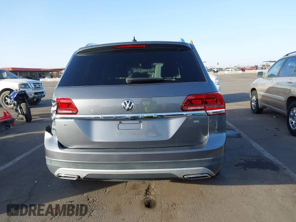 2018 Volkswagen Atlas SE with VIN 1V2DR2CA8JC502499, listed as a IAAI auction lot 41562852 with 142,362 mi miles and . Bid and sale history available at DreamBid. Image 16.