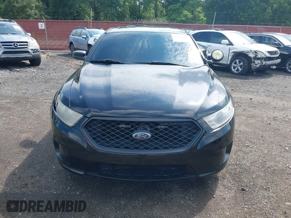 2014 Ford Police Interceptor with VIN 1FAHP2MK0EG170496, listed as a IAAI auction lot 42693683 with 147,921 mi miles and . Bid and sale history available at DreamBid. Image 12.