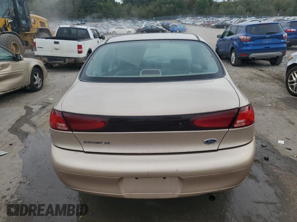 1999 Ford Escort SE z VIN 1FAFP13P7XW274653, wystawiony jako Copart lot #71997184 z przebiegiem 67 876 mil mil oraz Szkoda całkowita • Salvage title. Historia ofert i sprzedaży dostępna na DreamBid. Obrazek 6.