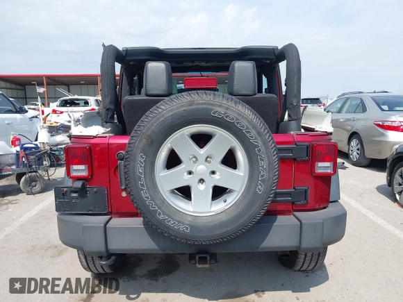 2013 Jeep Wrangler Sport z VIN 1C4GJWAG0DL543850, wystawiony jako IAAI lot #42374916 z przebiegiem 163 977 mil mil oraz . Historia ofert i sprzedaży dostępna na DreamBid. Obrazek 16.