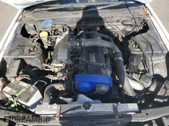 1989 Nissan Skyline z VIN HCR32034297, wystawiony jako Copart lot #79498714 z przebiegiem 125 635 mil mil oraz Czysty tytuł • Clean title. Historia ofert i sprzedaży dostępna na DreamBid. Obrazek 11.