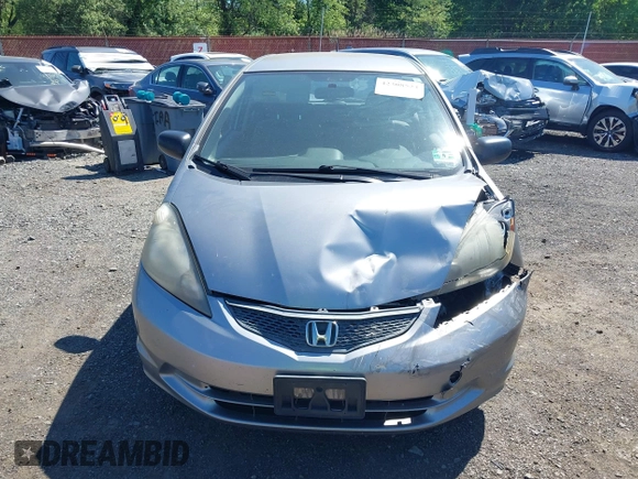 2009 Honda Fit with VIN JHMGE882X9S000639, listed as a IAAI auction lot 42308524 with 211,128 mi miles and . Bid and sale history available at DreamBid. Image 12.