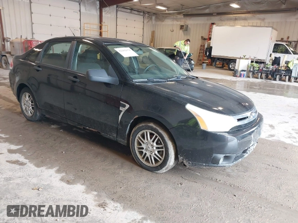 2009 Ford Focus SE with VIN 1FAHP35N69W128084, listed as a IAAI auction lot 42202678 with 290,358 mi miles. Bid and sale history available at carsss.com. Image 1.