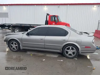 2002 Nissan Maxima GLE z VIN JN1DA31A32T308663, wystawiony jako IAAI lot #42136460 z przebiegiem 235 632 mil mil oraz . Historia ofert i sprzedaży dostępna na DreamBid. Obrazek 14.