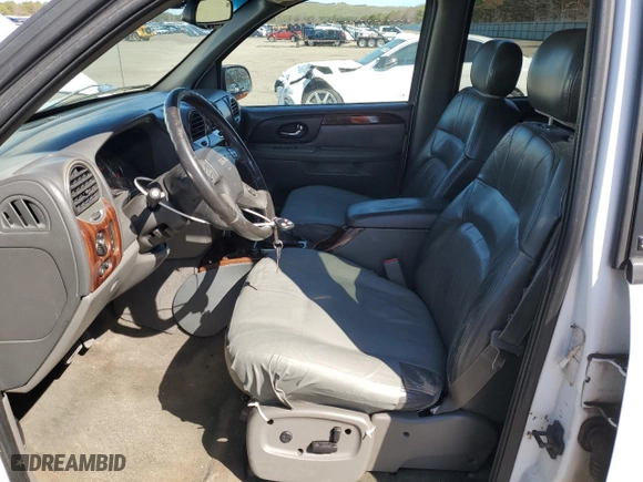 2003 GMC Envoy XL SLT with VIN 1GKET16S736179347, listed as a Copart auction lot 52370775 with 230,623 mi miles and Salvage Title. Bid and sale history available at carsss.com. Image 7.