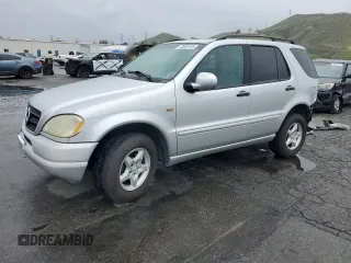 2000 Mercedes-Benz M-Class with VIN 4JGAB54E3YA208358, listed as a Copart auction lot 48889105 with 227,861 mi miles and Salvage Title. Bid and sale history available at carsss.com. Image 1.