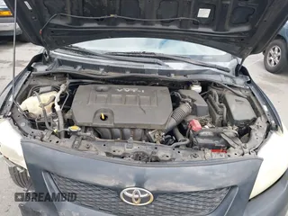 2009 Toyota Corolla with VIN 1NXBU40E59Z093650, listed as a IAAI auction lot 42121575 with 166,631 mi miles. Bid and sale history available at carsss.com. Image 10.