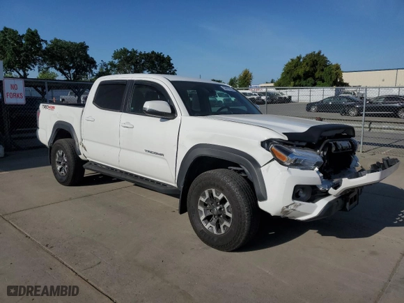 2023 Toyota Tacoma 4WD SR with VIN 3TMCZ5AN9PM638538, listed as a Copart auction lot 53910225 with 29,464 mi miles and Salvage Title. Bid and sale history available at carsss.com. Image 4.