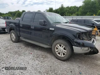 2004 Ford F-150 XLT with VIN 1FTPW14574KB96621, listed as a Copart auction lot 61137655 with 220,659 mi miles and Salvage title. Bid and sale history available at DreamBid. Image 4.