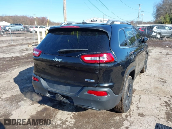 2016 Jeep Cherokee 75th Anniversary with VIN 1C4PJLCB5GW107918, listed as a IAAI auction lot 41923377 with 165,619 mi miles and . Bid and sale history available at DreamBid. Image 4.